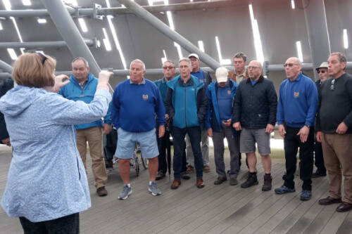 The choir singing inside a kelpie