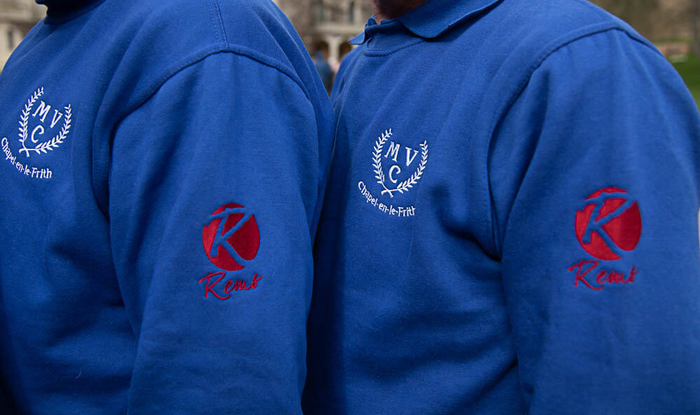 close up of the choir logo