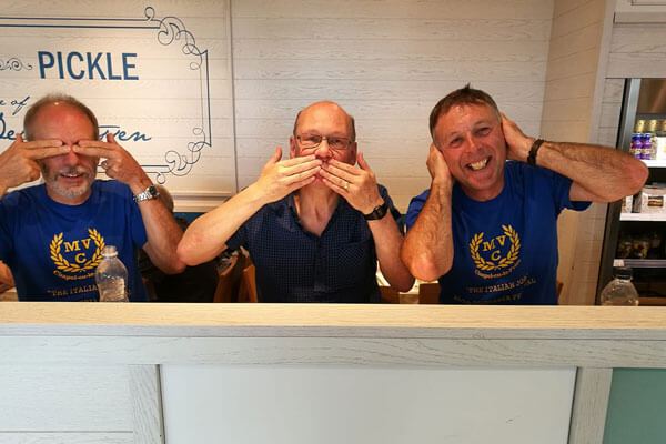 choir members relaxing enroute to foreign climes